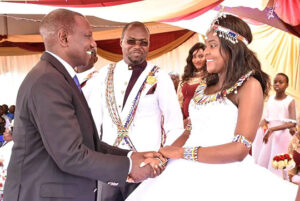 Johanna Ng'eno and his wife alongside President William Ruto