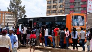 Passengers lining up to board a Super Metro Matatu