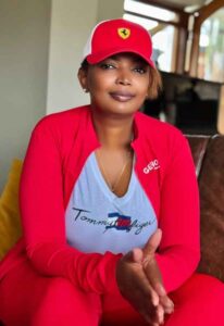 Karen Nyamu on a red sport outfit