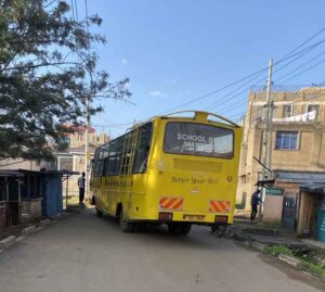 School bus using feeder road in Lolwe