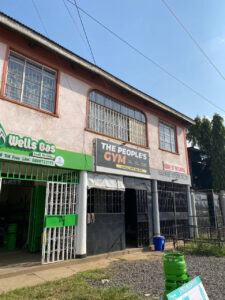 The building that has a gas and gym in Lolwe estate